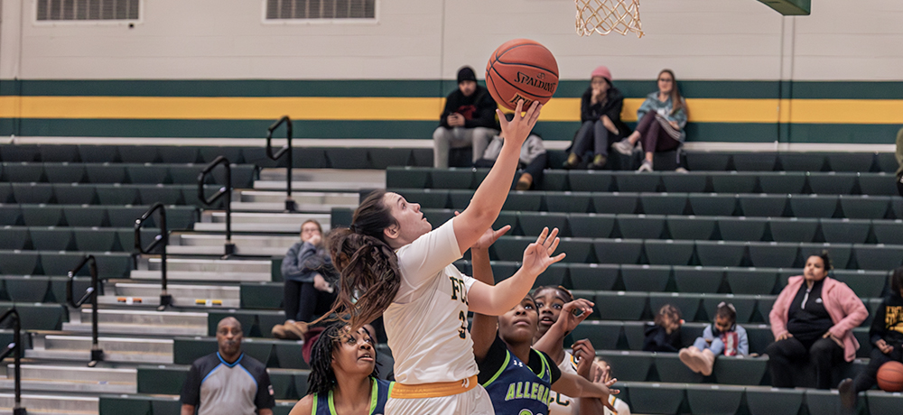 Cougars Extend Winning Streak to Seven: Triumph Over Allegany Trojans 73-63