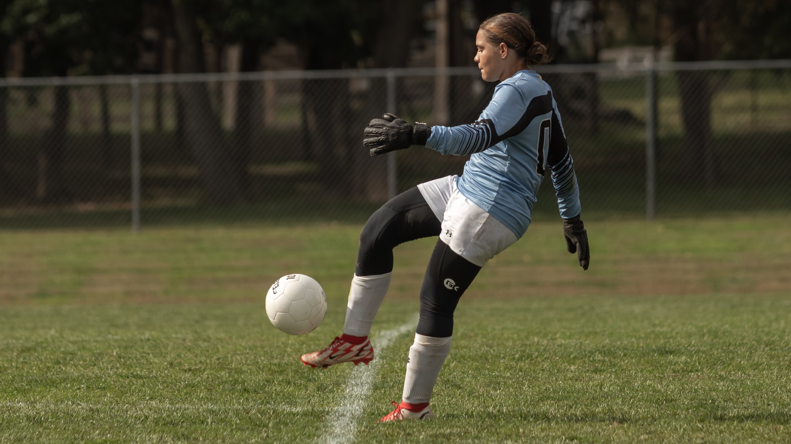 Cougars Battle Hard but Fall to Carroll at Home